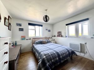 Bedroom One- click for photo gallery